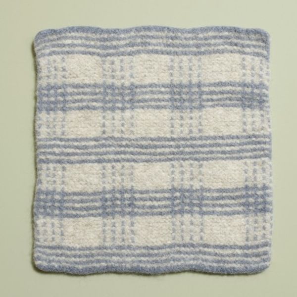 Rutete sitteunderlag